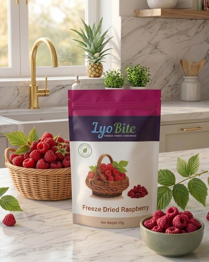 Lyo Bite freeze-dried raspberry package on a kitchen counter with raspberries.
